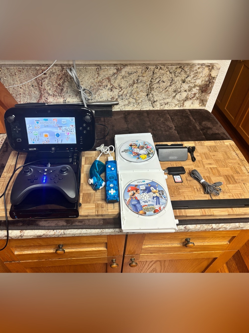 Nintendo Wii U Deluxe Black Console Bundle with Blue Controllers and Games